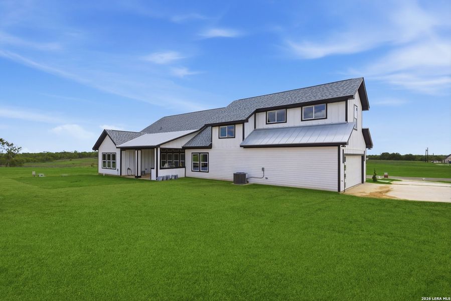 Exterior details and patio area of a home in , Floresville (Image 3).
