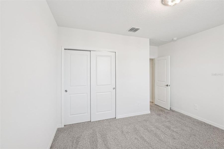 Spacious, unfurnished interior of a new home in Crosswinds - Signature Series, Haines City (Image 15).