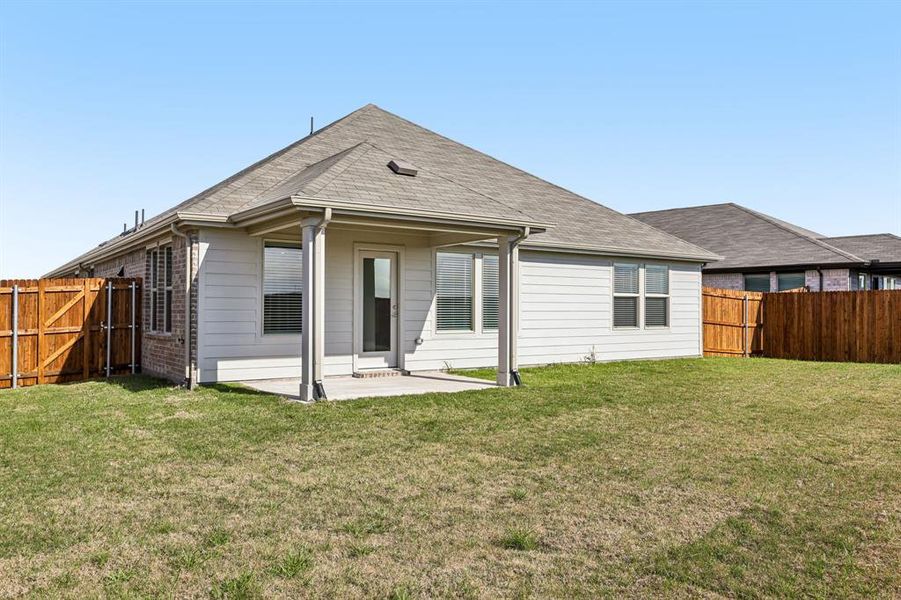 Exterior details and patio area of a home in Trails of Lavon - Signature Series, Lavon (Image 27). Exterior details and patio area of a home in Trails of Lavon - Signature Series, Lavon (Image 27).
