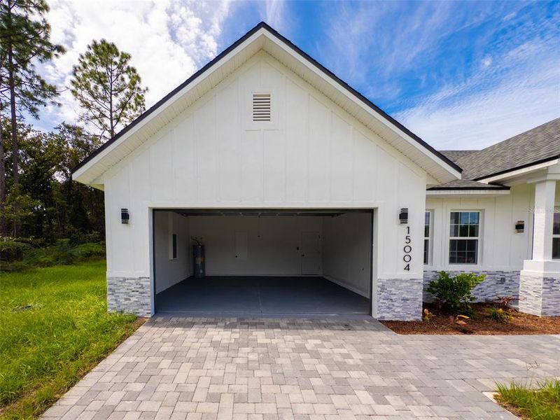 Front exterior of a new home in , Ocala, FL, highlighting curb appeal (Image 20).