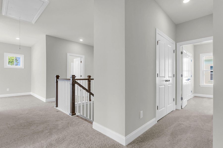 Spacious, unfurnished interior of a new home in Tidewater at Lakes of Cane Bay, Summerville (Image 38). Spacious, unfurnished interior of a new home in Tidewater at Lakes of Cane Bay, Summerville (Image 38).