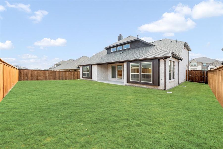 Exterior details and patio area of a home in Terracina, Rockwall (Image 24). Exterior details and patio area of a home in Terracina, Rockwall (Image 24).