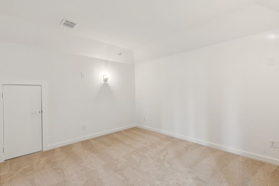 Media Room in the Da Vinci II home plan by Trophy Signature Homes – REPRESENTATIVE PHOTO