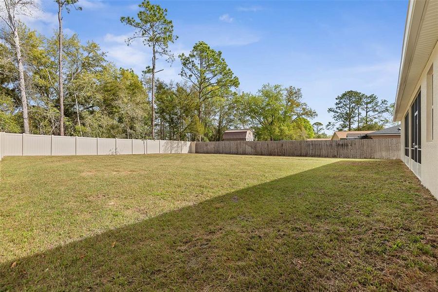 Exterior details and patio area of a home in , Palm Coast (Image 32).