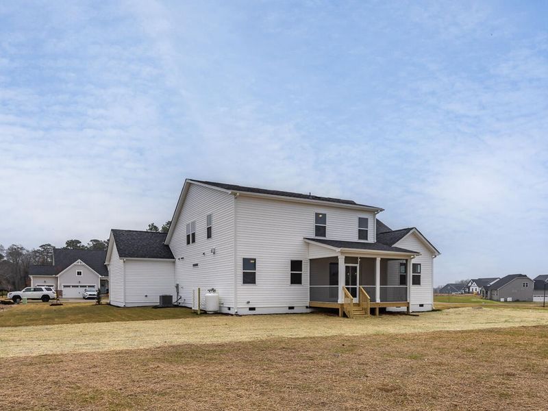 Exterior details and patio area of a home in Tobacco Road, Angier (Image 2).