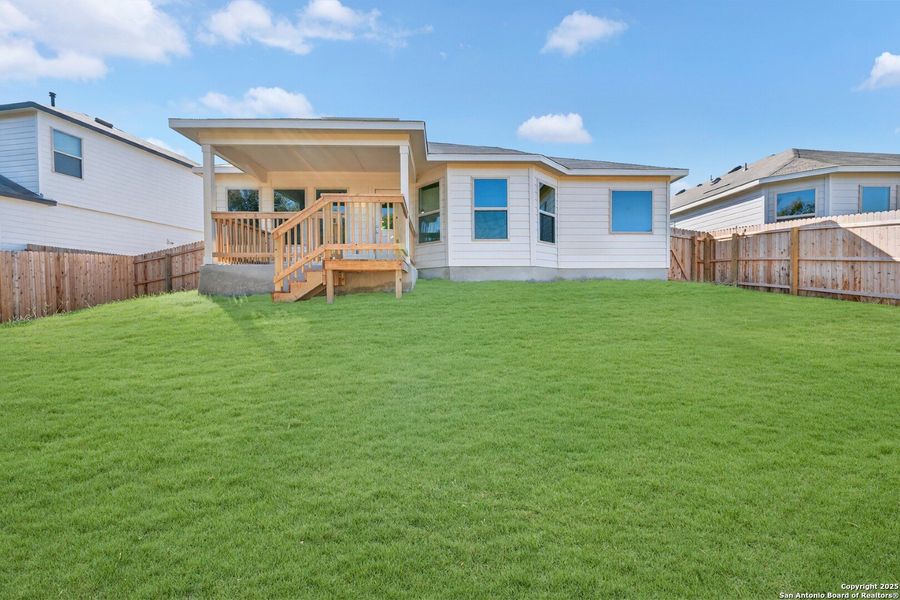 Exterior details and patio area of a home in Winding Brook, San Antonio (Image 20).