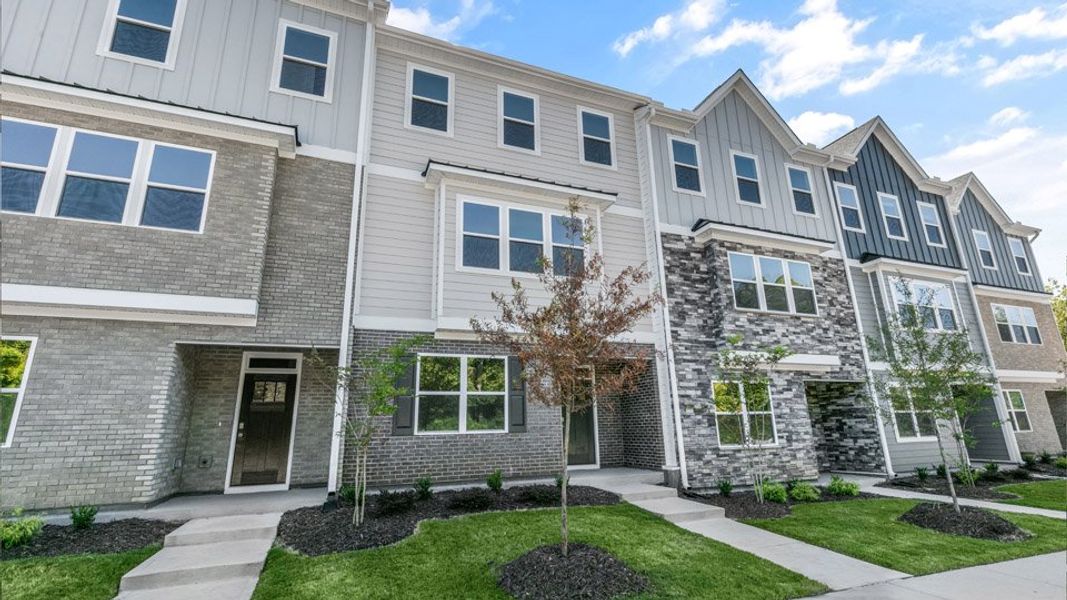 Representative exterior photo of a completed home built from the BLAKELY by D.R. Horton in The Townes at Madden West, Fuquay Varina, NC (Image 26).