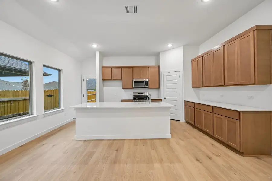 Furnished interior view inside a new home in Riviera Pines, Huffman (Image 3).