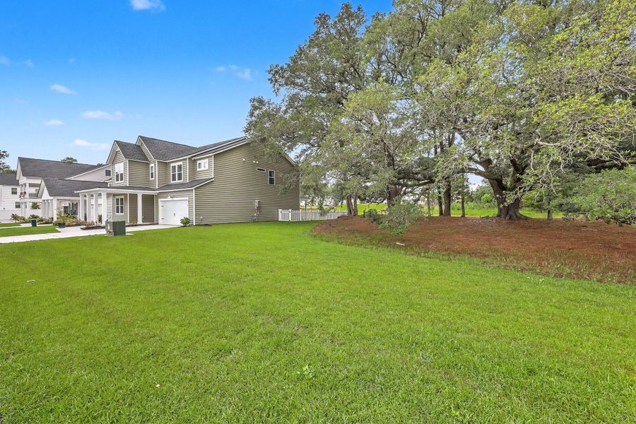 Exterior details and patio area of a home in Limehouse Farms, Summerville (Image 29).