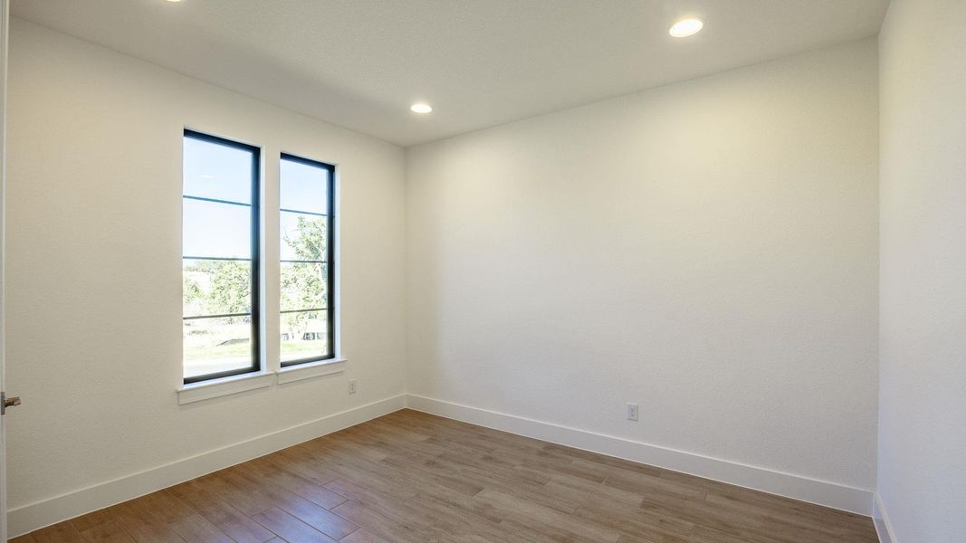 Spacious, unfurnished interior of a new home in Parkside on the River, Georgetown (Image 13).