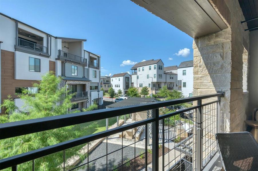 The balcony serves as a private outdoor retreat, perfect for reading a book or simply unwinding after a long day