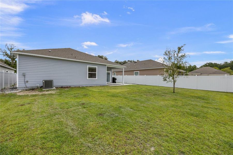 Front exterior of a new home in , Newberry, FL, highlighting curb appeal (Image 29).