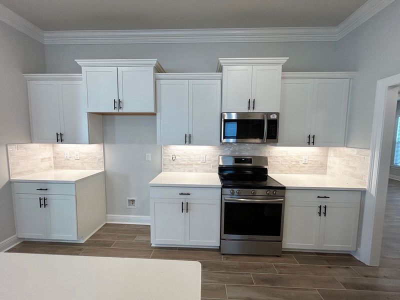 Furnished interior view inside a new home in Natureview, Freeport (Image 4).