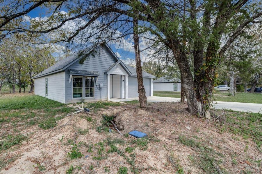 View of front of property with concrete driveway View of front of property with concrete driveway