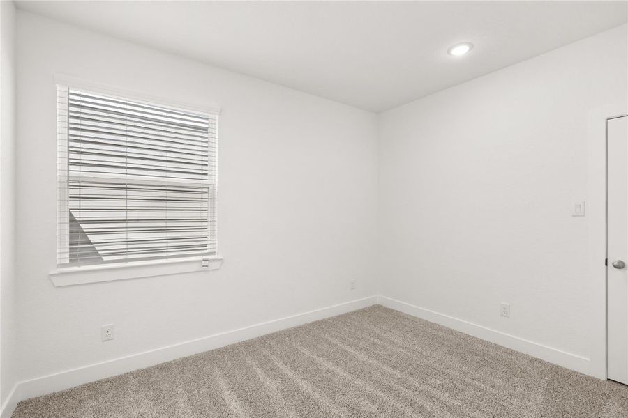 Spacious, unfurnished interior of a new home in The Woodlands Hills, Willis (Image 19).
