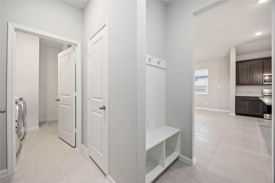 Furnished interior view inside a new home in Sunterra, Katy (Image 7).