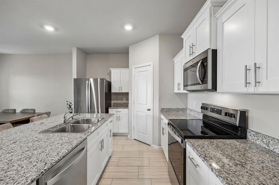Furnished interior view inside a new home in River's Edge, Fort Worth (Image 8).
