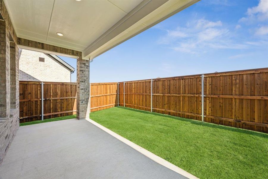 The large covered back patio and private fenced yard create the ideal space for fun outdoor family get togethers! The large covered back patio and private fenced yard create the ideal space for fun outdoor family get togethers!