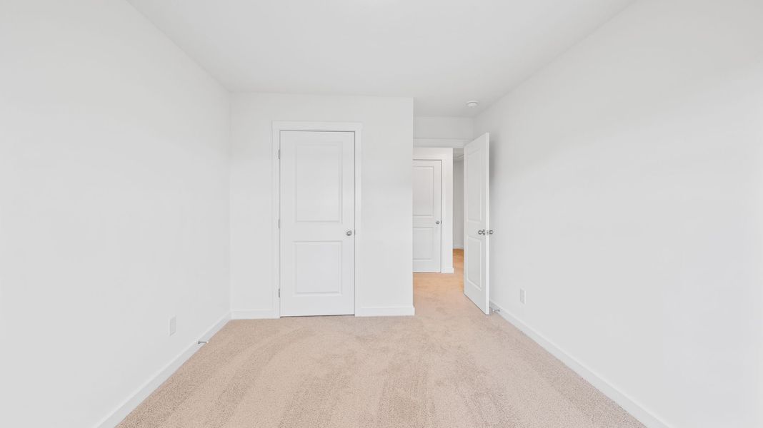 Spacious, unfurnished interior of a new home in The Cove at Thrasher Landing, Hixson (Image 18).