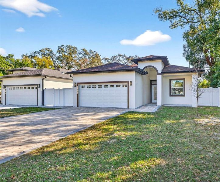 Front exterior of a new home in , Tampa, FL, highlighting curb appeal (Image 2). Front exterior of a new home in , Tampa, FL, highlighting curb appeal (Image 2).