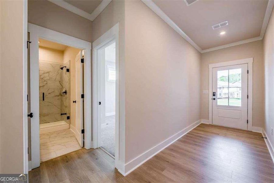 Spacious, unfurnished interior of a new home in The Paddocks at Doc Hughes, Buford (Image 24).