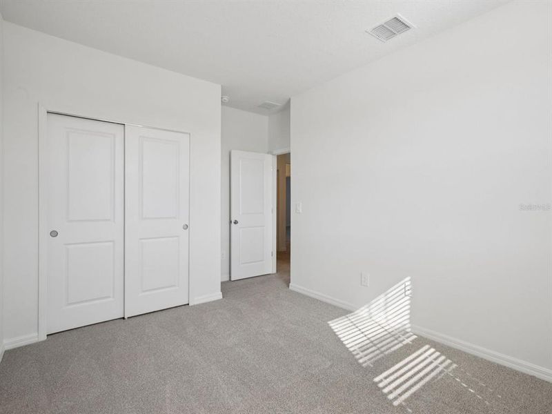 Spacious, unfurnished interior of a new home in Coasterra - Reserve Series, Palmetto (Image 9).