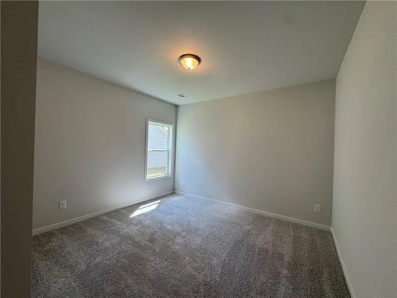Spacious, unfurnished interior of a new home in Rosewood Lake Preserve, Hoschton (Image 22).