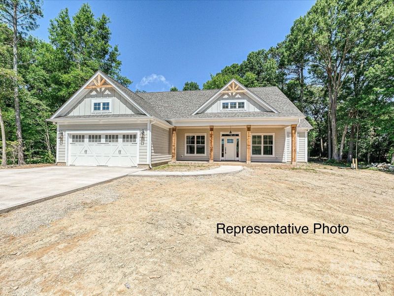 Front exterior of a new home in , Monroe, NC, highlighting curb appeal (Image 5).