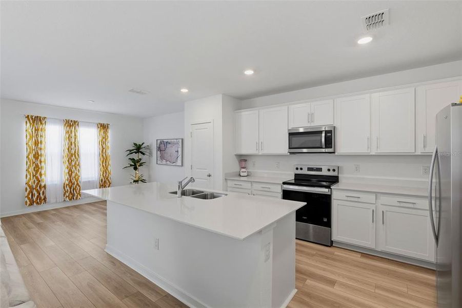 Furnished interior view inside a new home in Oakfield Lakes, Parrish (Image 6).