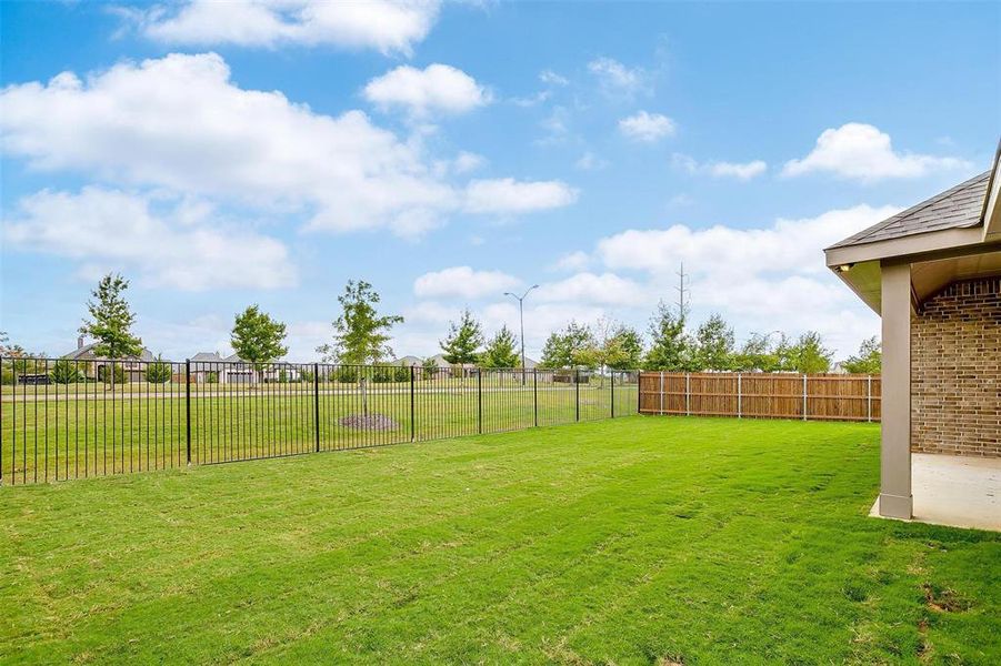 View of yard with a patio