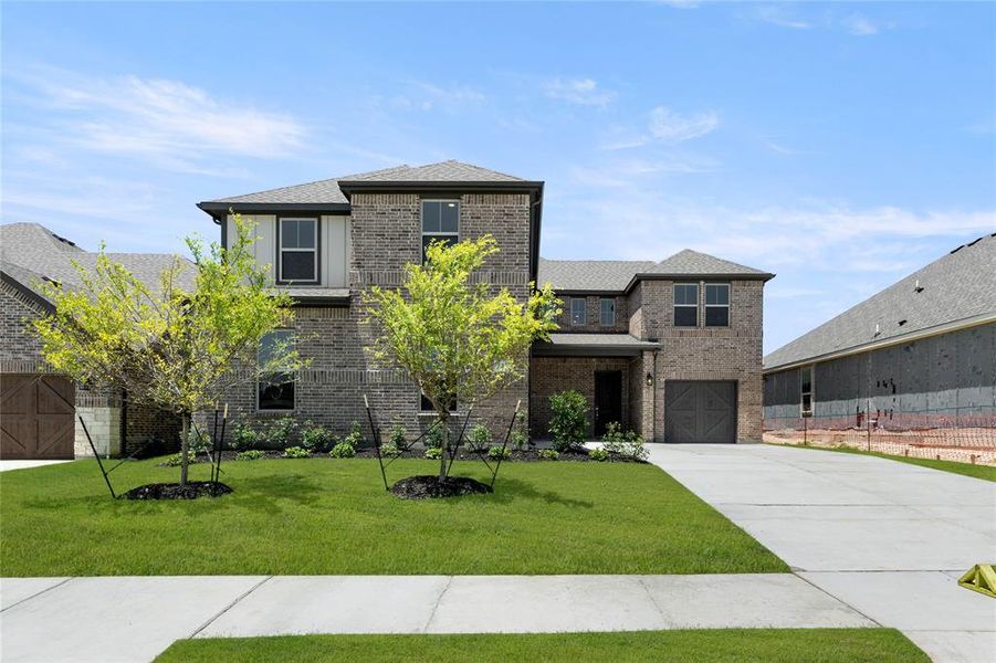 Front exterior of a new home in Inspiration Collection at Bridgewater, Midlothian, TX, highlighting curb appeal (Image 2). Front exterior of a new home in Inspiration Collection at Bridgewater, Midlothian, TX, highlighting curb appeal (Image 2).