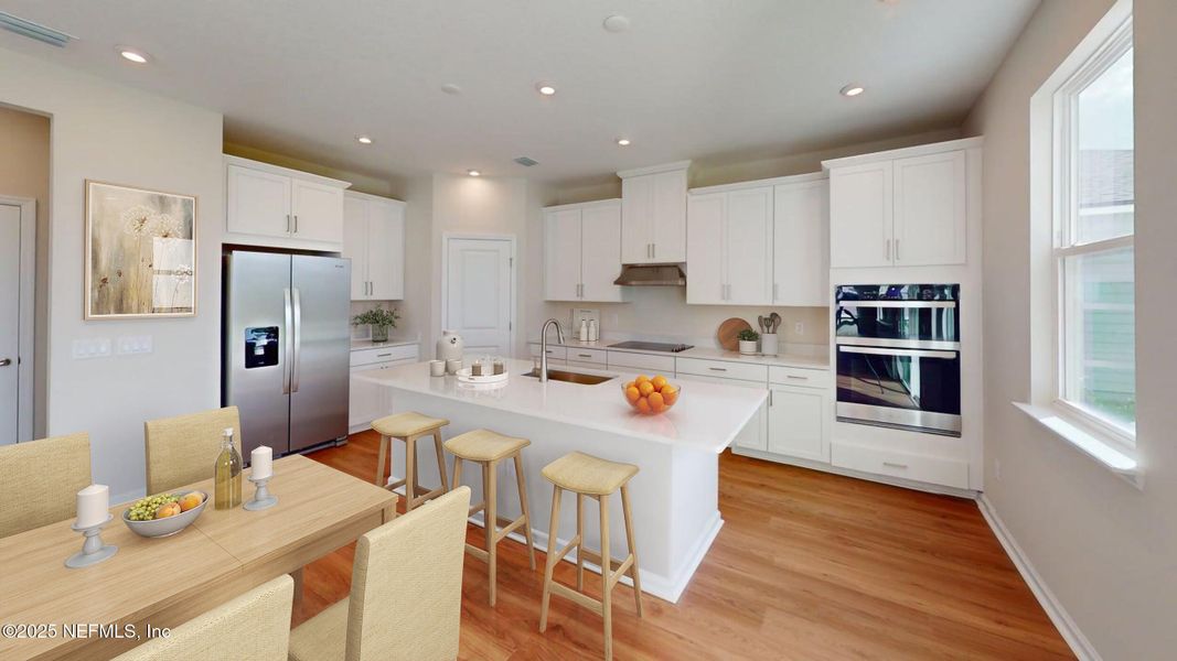 Furnished interior view inside a new home in Lakes at Bella Lago, Green Cove Springs (Image 4). Furnished interior view inside a new home in Lakes at Bella Lago, Green Cove Springs (Image 4).