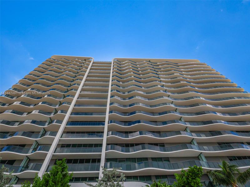 Front exterior of a new home in Casamar, Pompano Beach, FL, highlighting curb appeal (Image 29). Front exterior of a new home in Casamar, Pompano Beach, FL, highlighting curb appeal (Image 29).