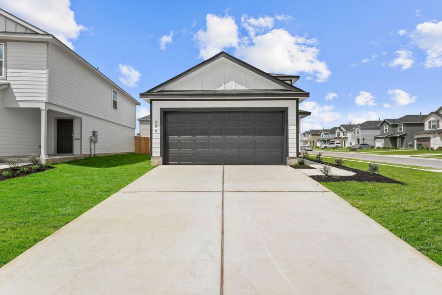 Front exterior of a new home in , Maxwell, TX, highlighting curb appeal (Image 1). Front exterior of a new home in , Maxwell, TX, highlighting curb appeal (Image 1).