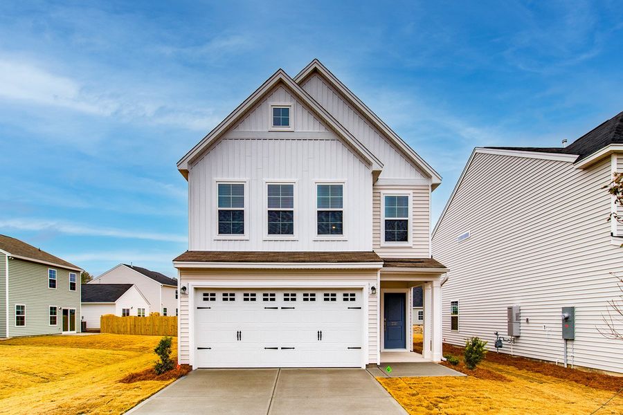 Front exterior of a new home in Bluefield, Lexington, SC, highlighting curb appeal (Image 1).