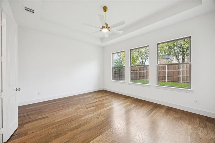 The dreamy owner's suite is located at the rear of the home for additional privacy.