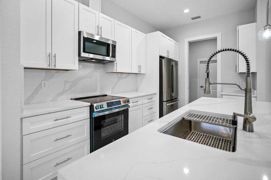 Furnished interior view inside a new home in , Port Charlotte (Image 10). Furnished interior view inside a new home in , Port Charlotte (Image 10).