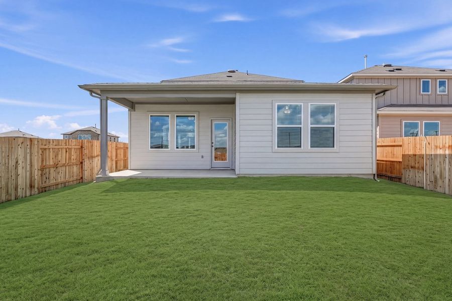 Exterior details and patio area of a home in Sunfield, Buda (Image 16).