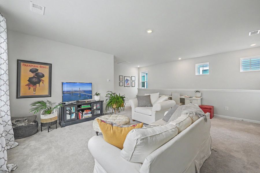 Furnished interior view inside a new home in Limehouse Village: Row Collection, Summerville (Image 11).