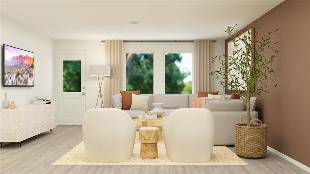 Living room with wood finished floors and baseboards