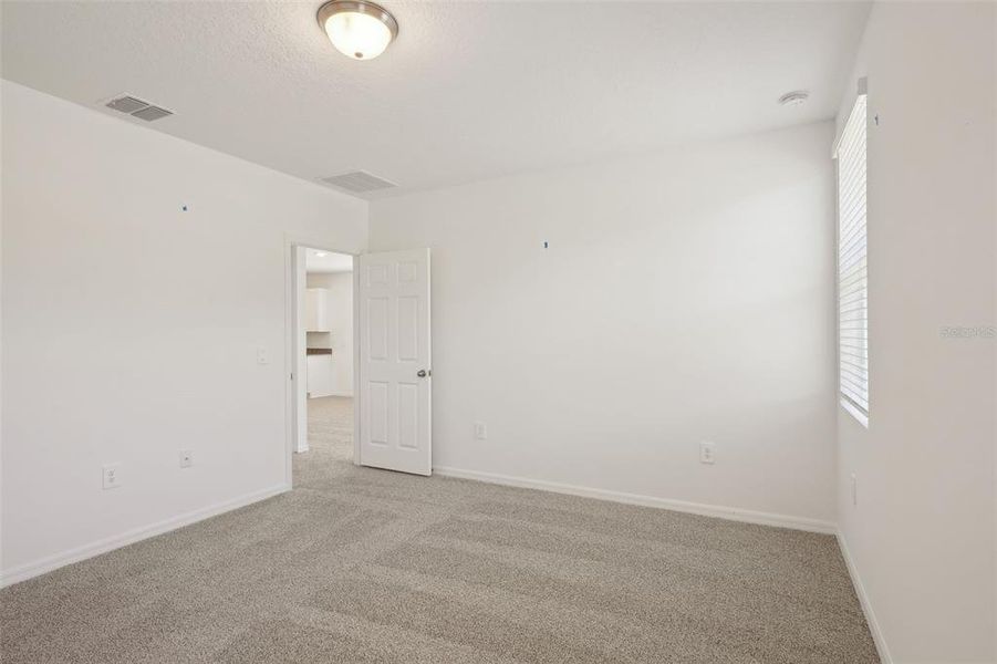 Spacious, unfurnished interior of a new home in Lake Deer Estates - Signature Series, Poinciana (Image 13). Spacious, unfurnished interior of a new home in Lake Deer Estates - Signature Series, Poinciana (Image 13).