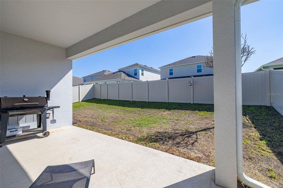 Exterior details and patio area of a home in Hartwood Landing, Clermont (Image 3).