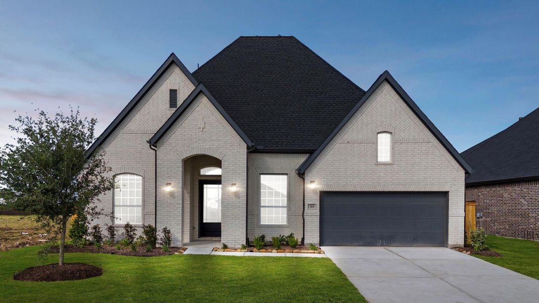 Front exterior of a new home in Brookewater, Rosenberg, TX, highlighting curb appeal (Image 18). Front exterior of a new home in Brookewater, Rosenberg, TX, highlighting curb appeal (Image 18).