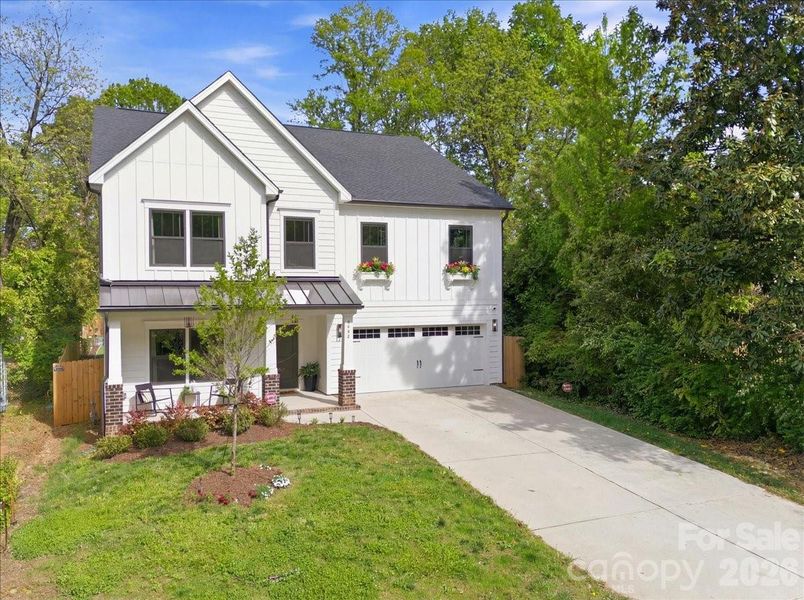 Front exterior of a new home in , Charlotte, NC, highlighting curb appeal (Image 2). Front exterior of a new home in , Charlotte, NC, highlighting curb appeal (Image 2).