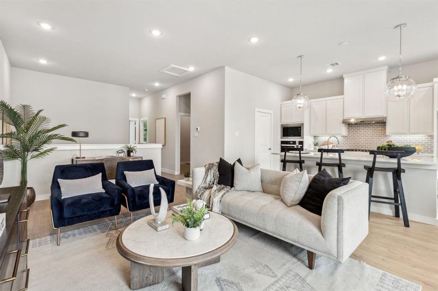 Living room featuring light hardwood / wood-style flooring