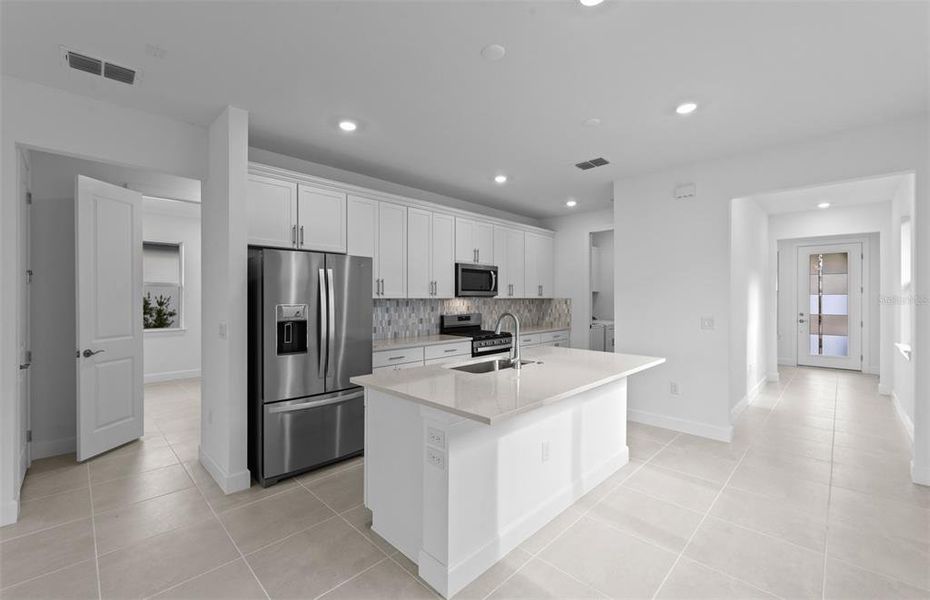 Furnished interior view inside a new home in BeachWalk by Manasota Key, Englewood (Image 6). Furnished interior view inside a new home in BeachWalk by Manasota Key, Englewood (Image 6).
