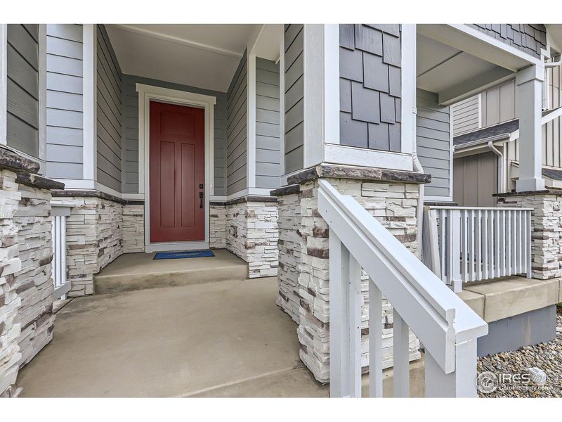 Exterior details and patio area of a home in Barefoot Lakes, Longmont (Image 4).