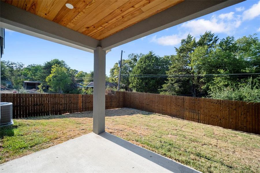 View of yard featuring a patio and central AC