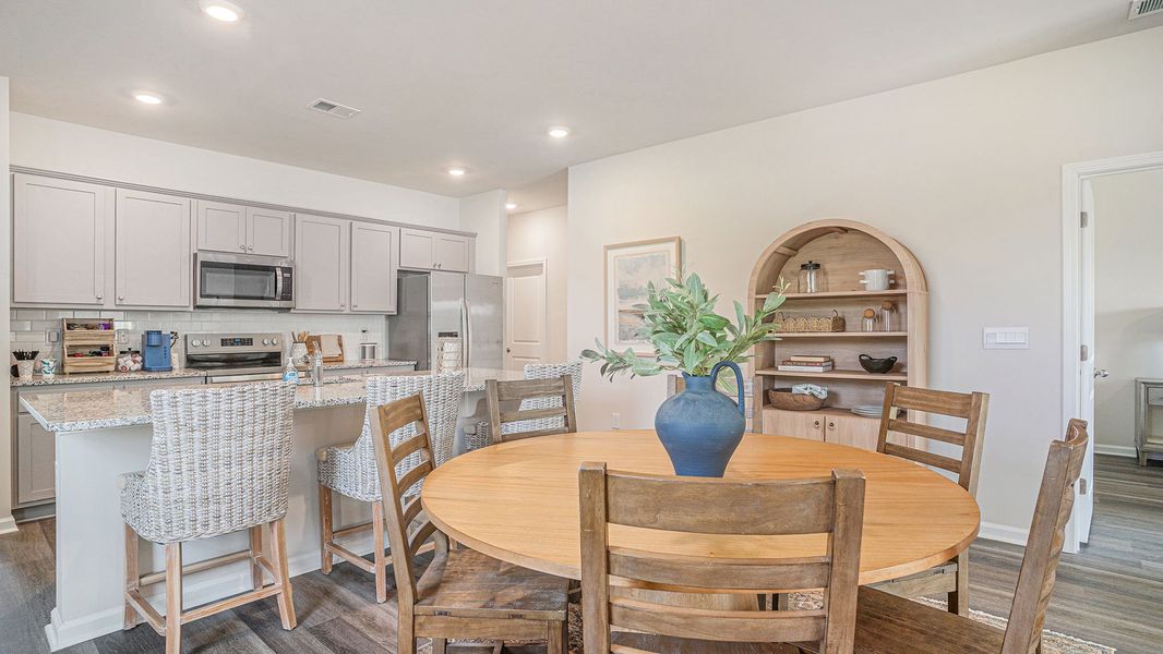 Representative furnished interior of a home built from the MANNING by D.R. Horton in Dove Crossing, Conway (Image 5).