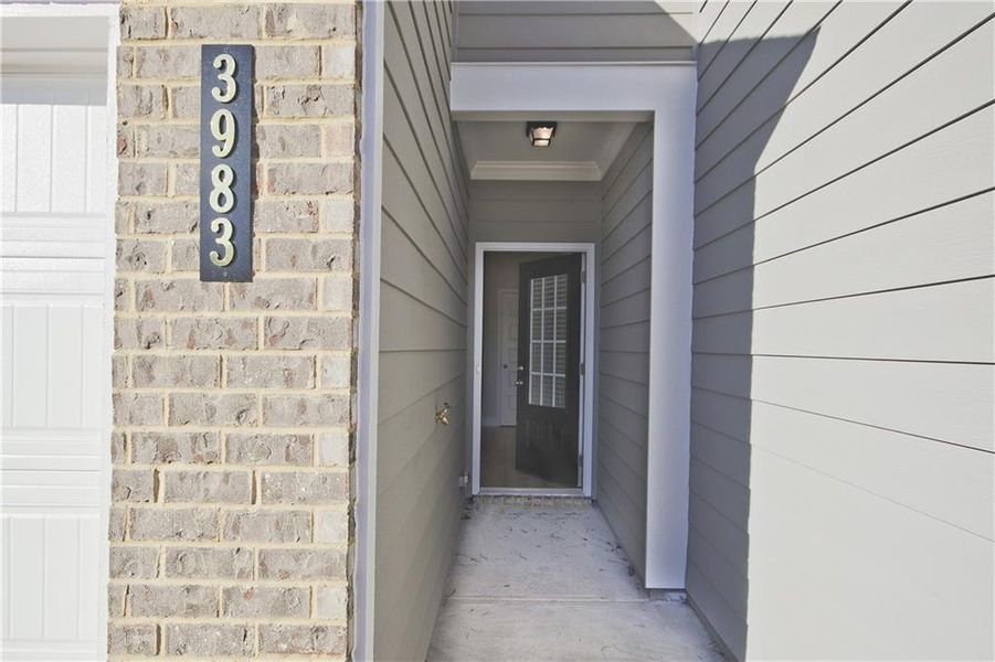 Exterior details and patio area of a home in Somerset at Riverbrook, Gainesville (Image 4).